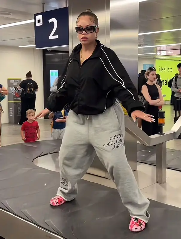 American Rapper Latto in Black Track Jacket – July 2025 Fashion Statement