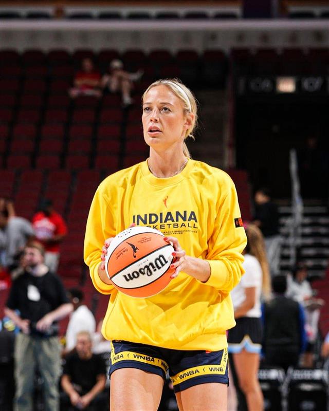 WNBA 2025: Sophie Cunningham Turns Heads in a Yellow Indiana Fever Sweatshirt